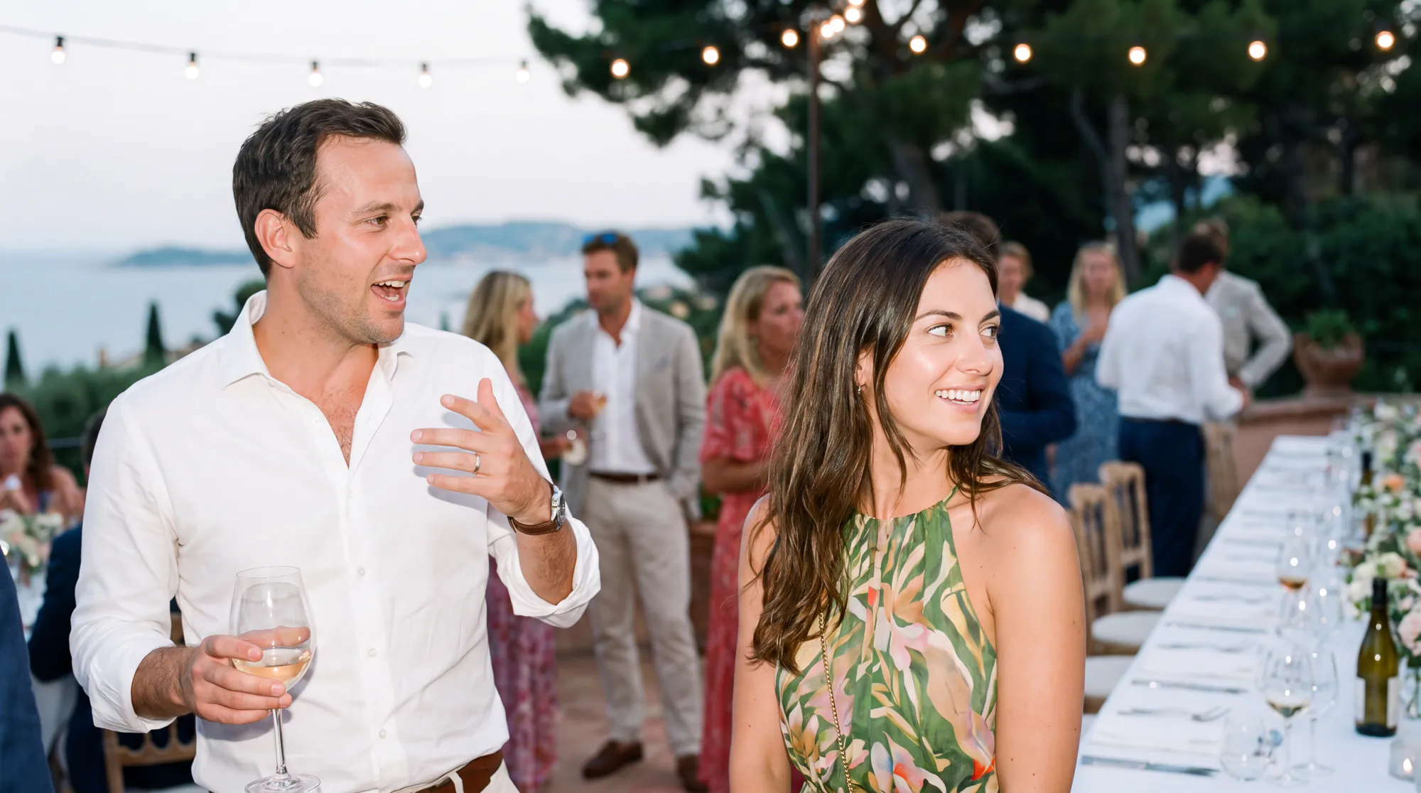 Family gathered on a villa terrace on the French Riviera
